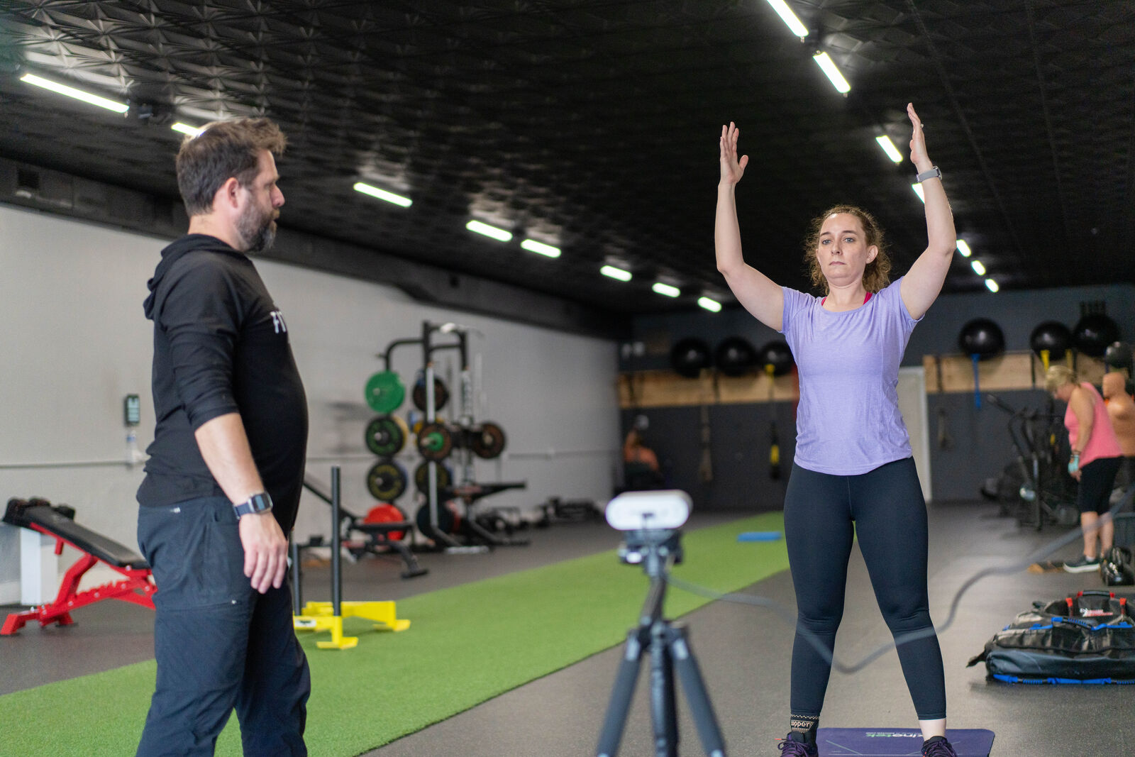 Member completing a Kinotek movement assessment with their coach